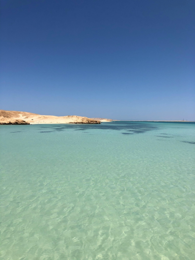 Snorkeling in Hurghada along the Red Sea, showcasing colorful coral reefs and tropical fish.