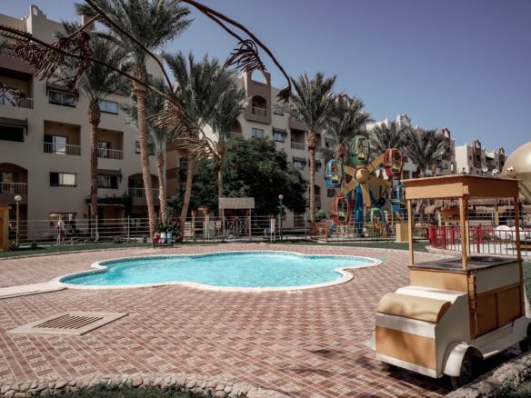 Relax by the pool at AlKarma Aqua Beach and enjoy the perfect blend of comfort, elegance, and seaside serenity.