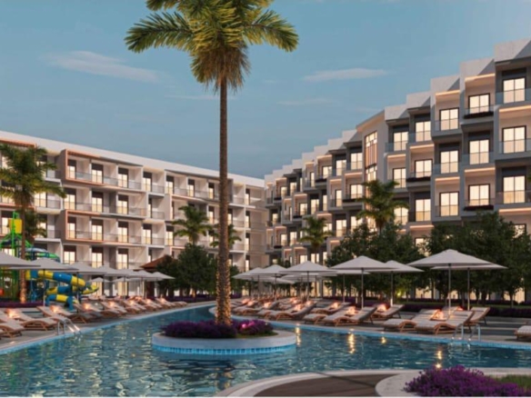 Enjoy the serene pool area at Bella Bay Hurghada, combining relaxation, elegance, and scenic Red Sea surroundings.