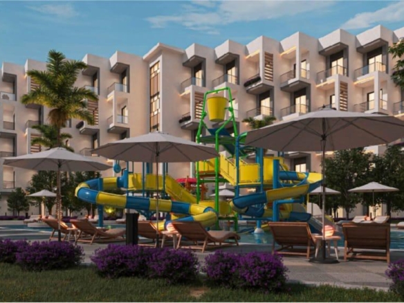 Enjoy the serene pool area at Bella Bay Hurghada, combining relaxation, elegance, and scenic Red Sea surroundings.