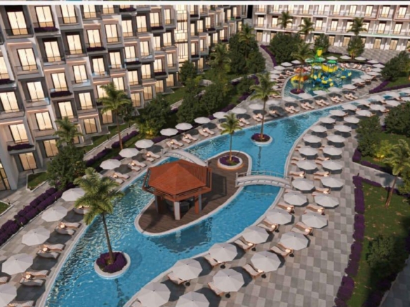 Enjoy the serene pool area at Bella Bay Hurghada, combining relaxation, elegance, and scenic Red Sea surroundings.