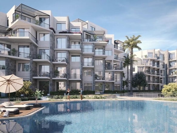 Enjoy the relaxing atmosphere by the pool at Majra, where comfort meets elegance and seaside charm.