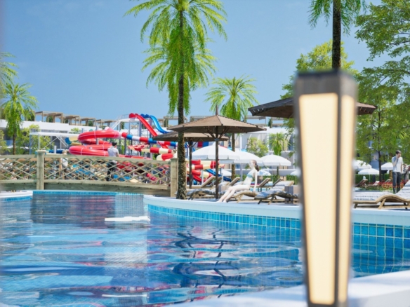 The front façade of Holidays Park blends contemporary architecture with the charm of a luxurious resort lifestyle.