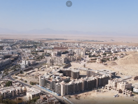 An elegant aerial view of Atlantis Hurghada highlighting its modern design and resort-style community.