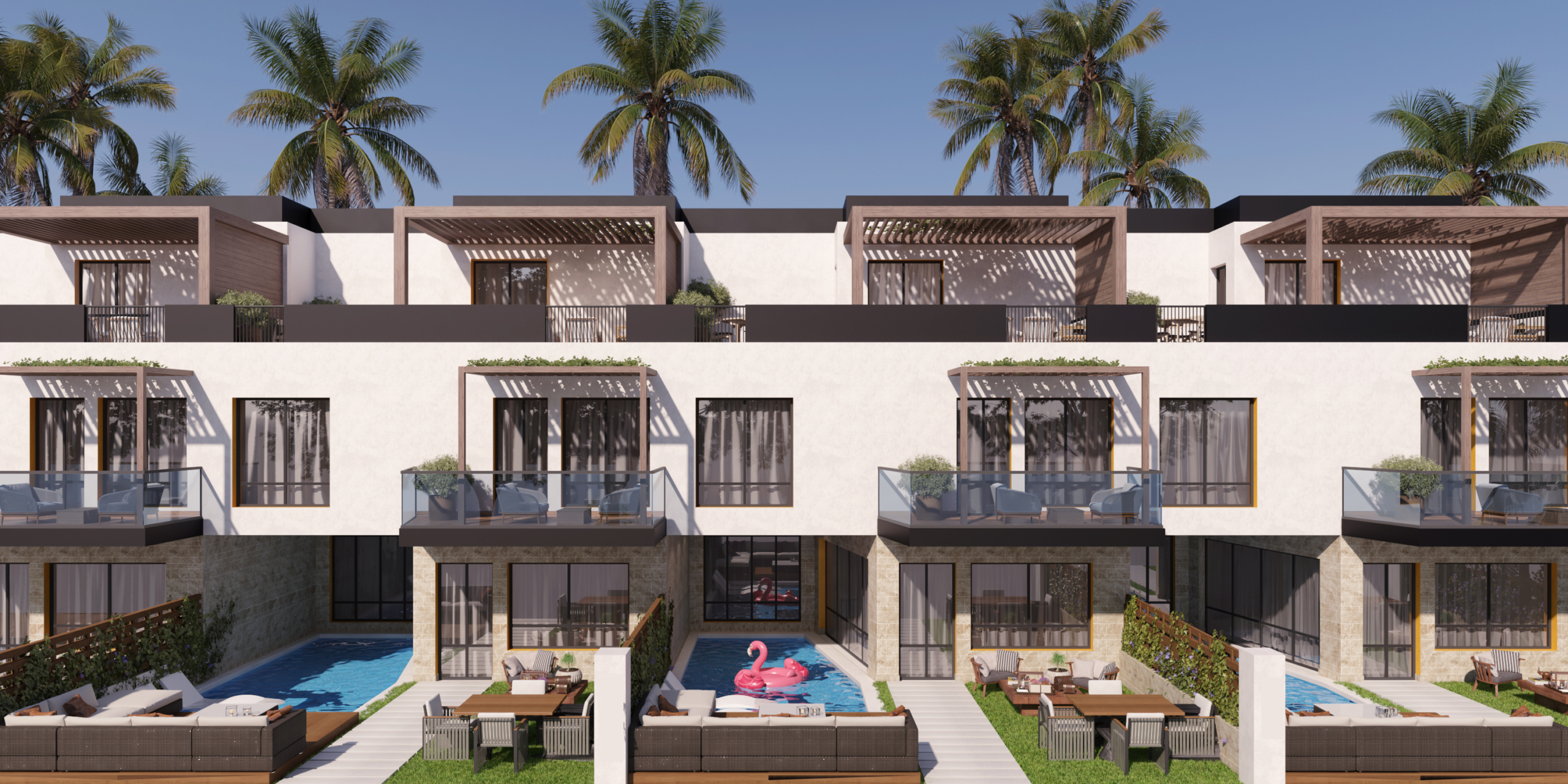 Aerial view of the 10 best compounds in Hurghada for Europeans, featuring modern residential units, pools, and Red Sea access